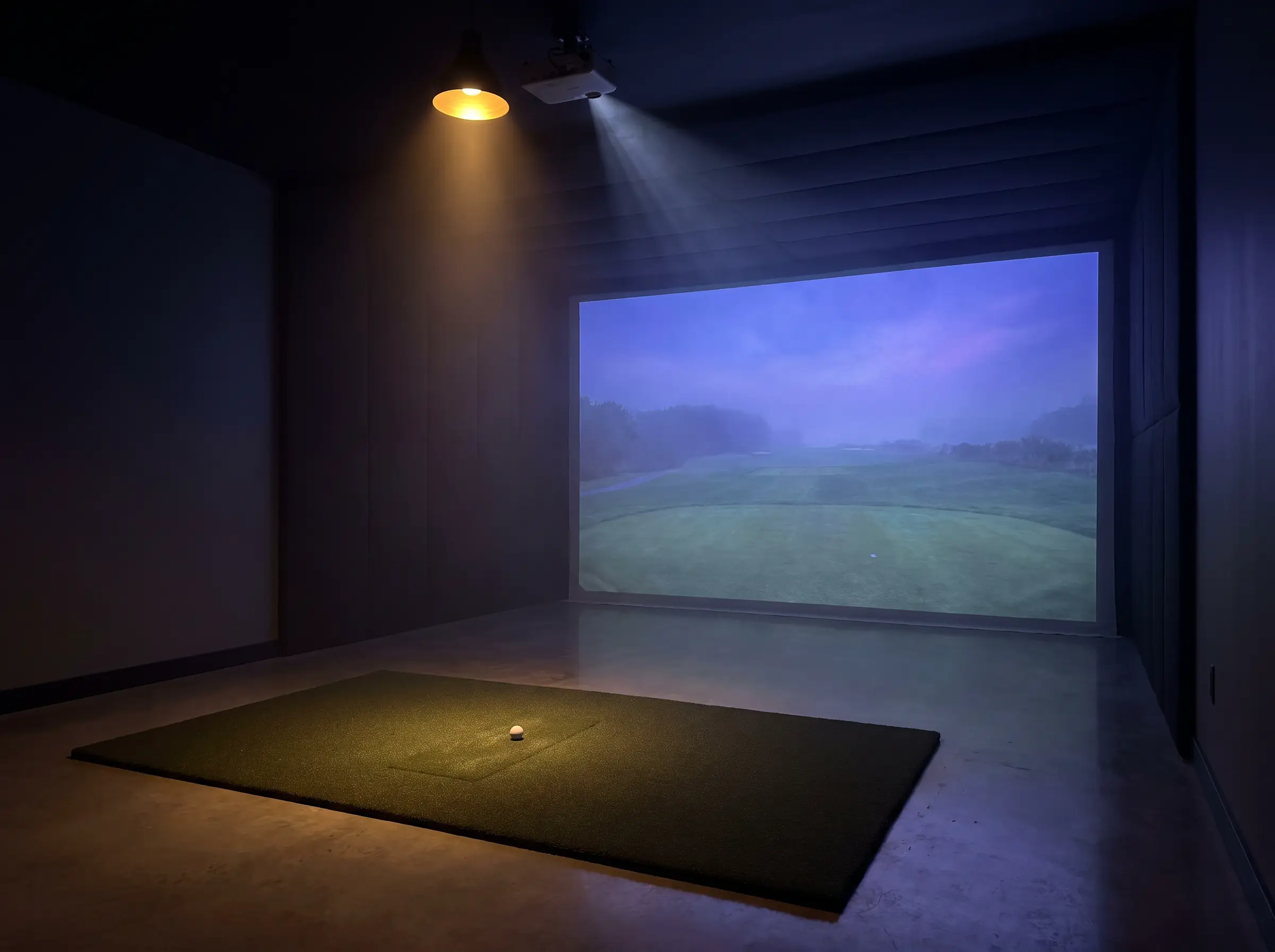 Dark premium golf simulator studio at Atlas Golf, Brookfield
